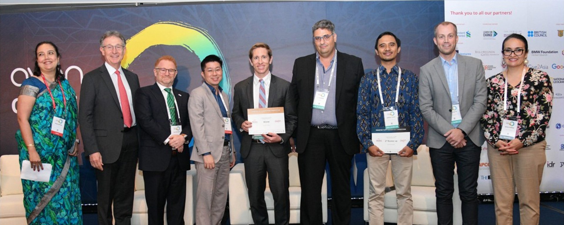 People being awarded disaster technology innovation programme (D-Tech) awards