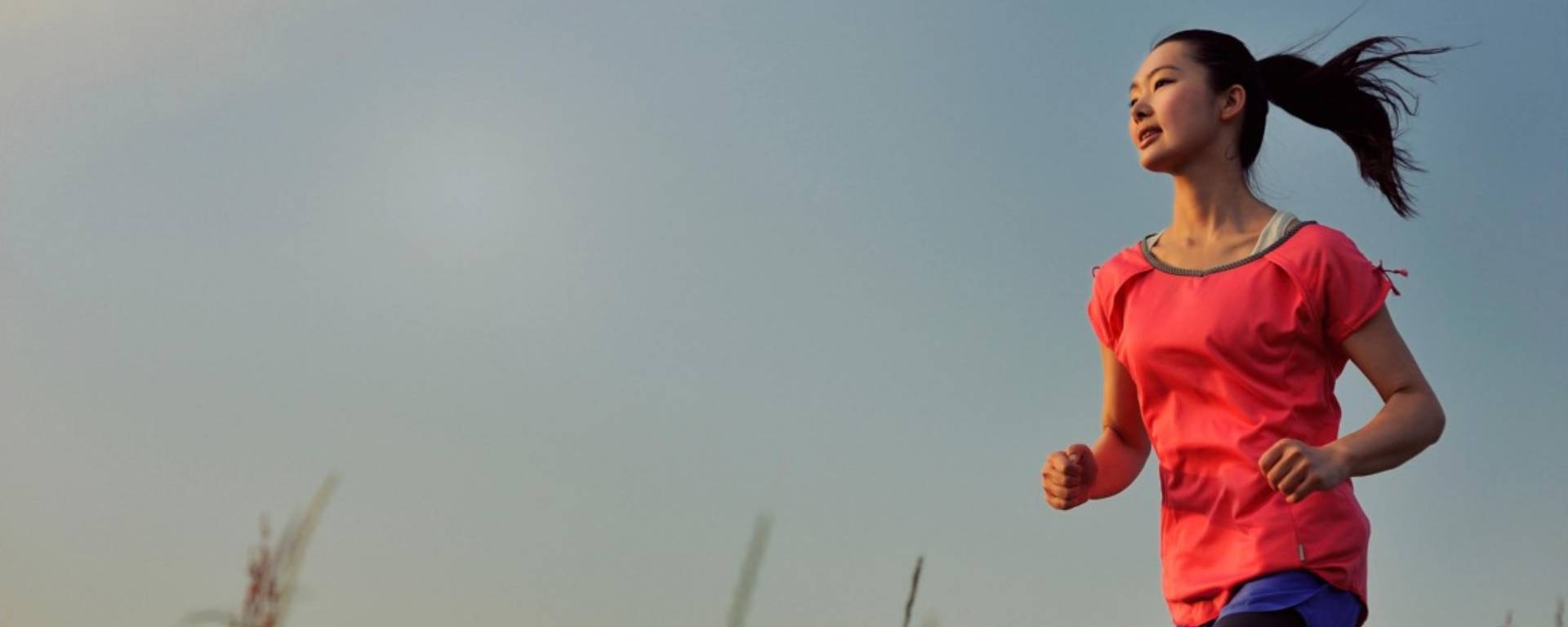 Women in red running
