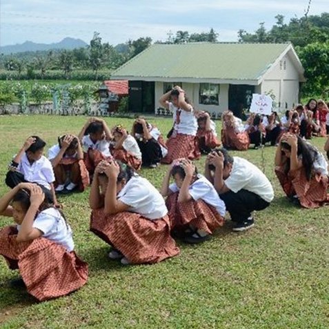 Students undergoing disaster preparedness training at school as part of the Safe Schools programme